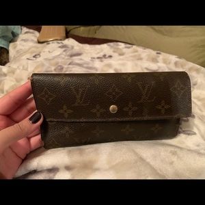 Louis Vuitton wallet.
